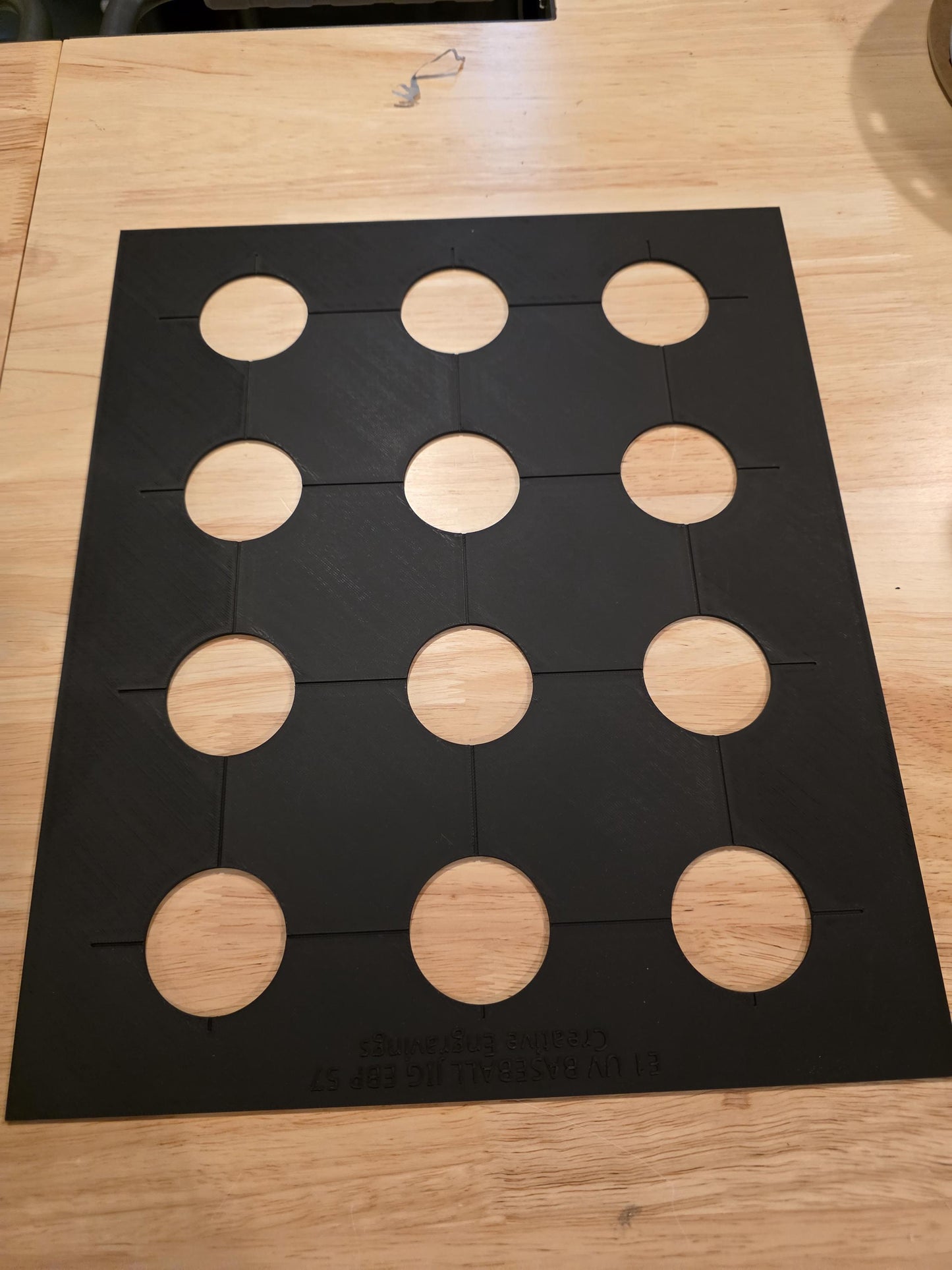 This tray rests on top of the balls and help with alignment