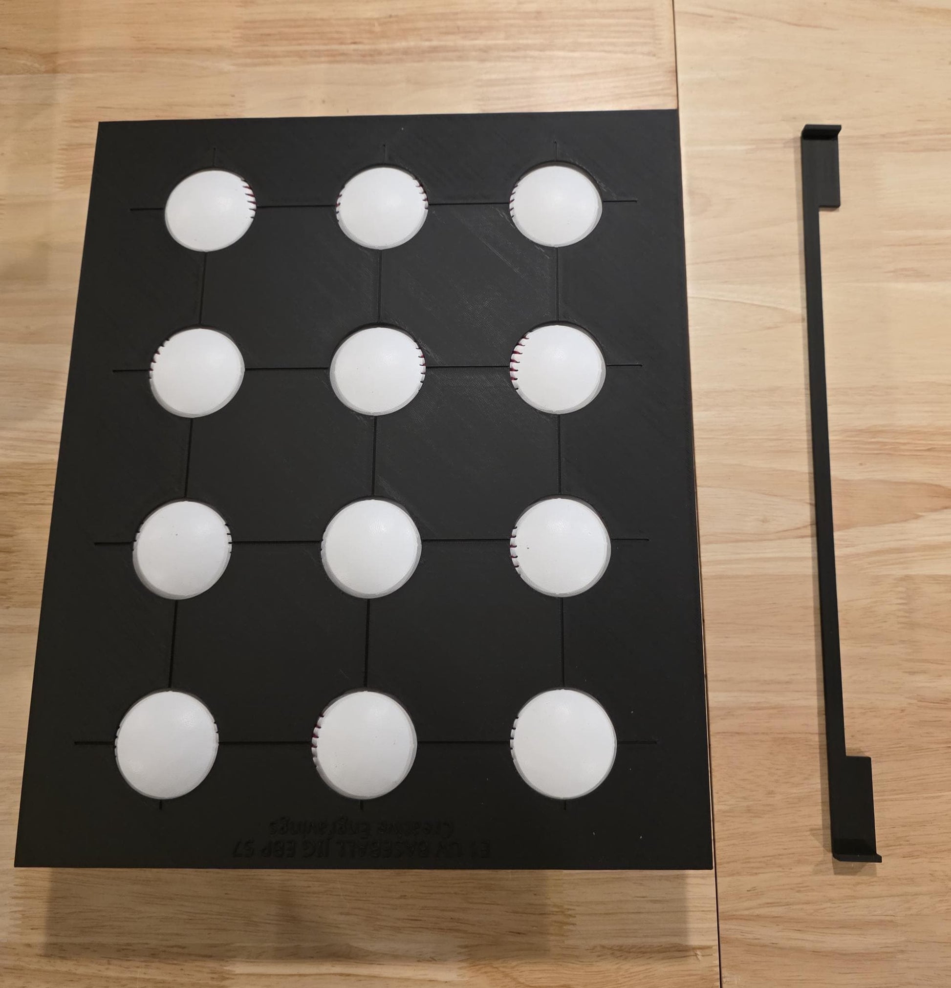 This is the base ball jig the base ball alignment tray and the alignment bar that helps center the jig on the bed