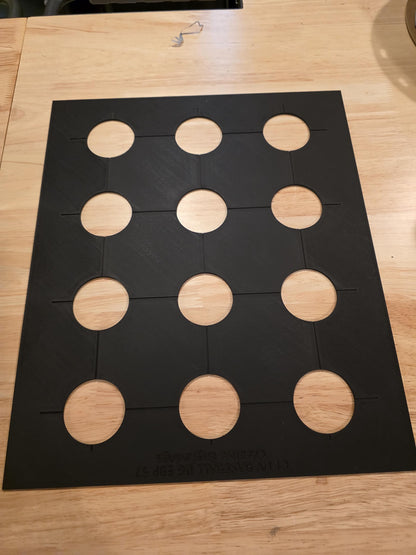 This tray rests on top of the balls and help with alignment